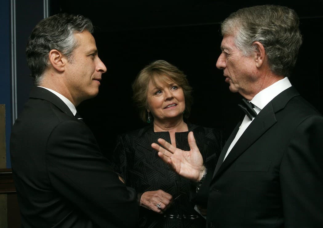 Jon Stewart and Grace Anne Koppel talking to Ted Koppel after the presentation of the Lifetime Achievement Award to the former "Nightline" anchor in 2007. (Tina Fineberg/AP)