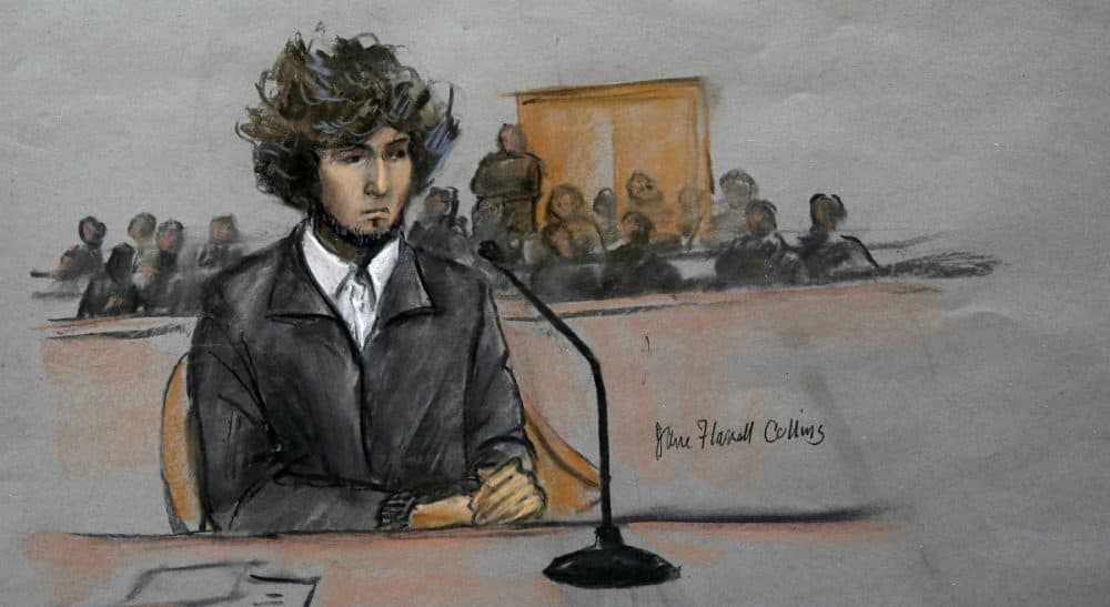 Author Erin Dionne writes about the process of being summoned, the months-long interruption to her life and what it was like to be in the presence of the admitted Boston Marathon bomber. In this courtroom sketch, Dzhokhar Tsarnaev is depicted sitting in federal court in Boston Thursday, Dec. 18, 2014. Tsarnaev is charged with the April 2013 attack that killed three people and injured more than 260. He could face the death penalty if convicted. (Jane Flavell Collins/AP)
