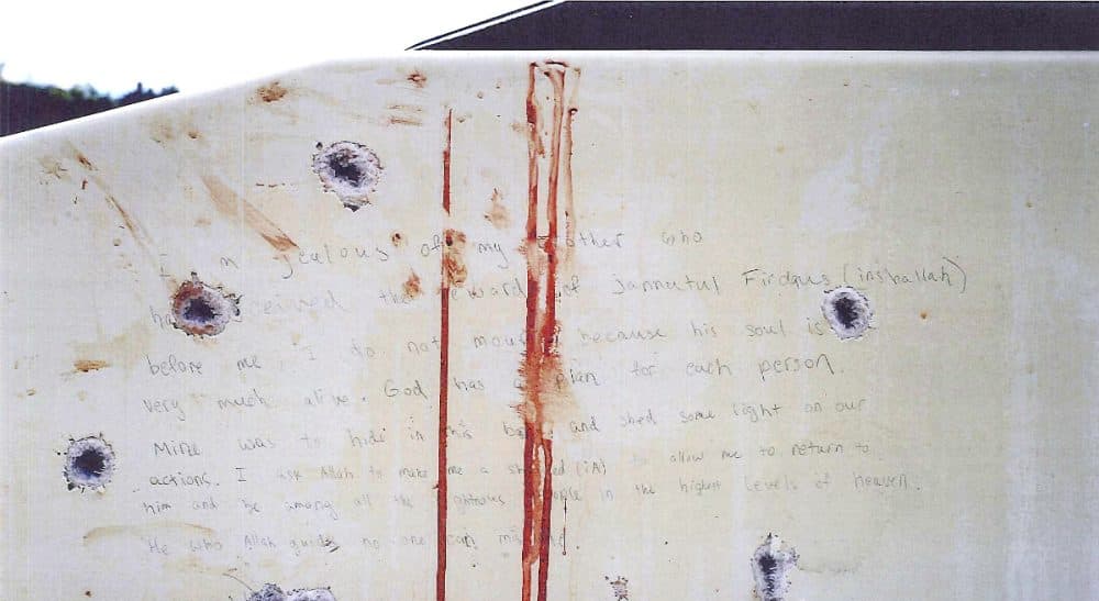 If Dzohkhar Tsarnaev admits that he did it, to what end are we revisiting the gruesome details of April 2013? This undated forensics photograph presented as evidence during the federal death penalty trial of Tsarnaev Tuesday, March 10, 2015, in Boston, shows handwriting on the bullet-riddled, blood-stained wall of a boat. The prosecution presented the photo as evidence of the handwritten note found inside the boat where Tsarnaev was captured April 19, 2013 in Watertown, Mass., four days after the Boston Marathon bombings. (U.S. Attorney's Office/AP)