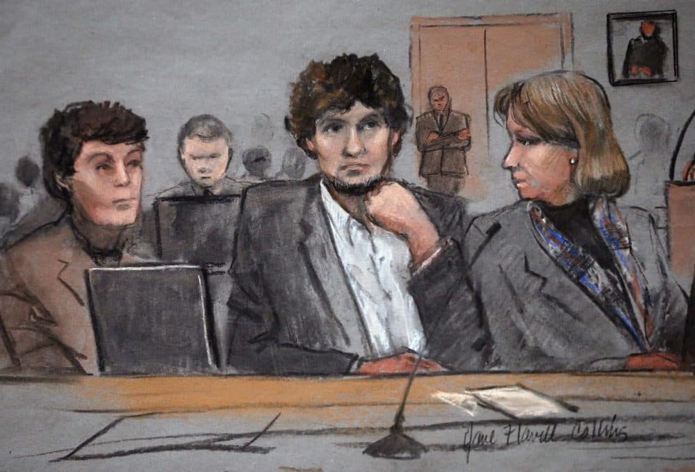 In this courtroom sketch, Dzhokhar Tsarnaev, center, is depicted between defense attorneys Miriam Conrad, left, and Judy Clarke, right, during his federal death penalty trial Thursday. (Jane Flavell Collins/AP)