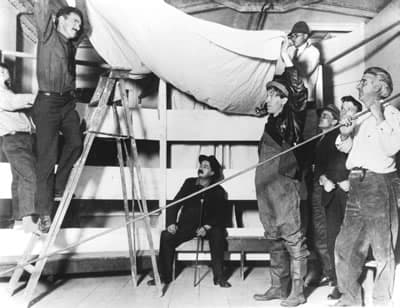 Actors and crew members from the Provincetown Players set up.for O'Neill's "Bound East for Cardiff." O'Neill is on far left (Courtesy)