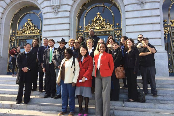 A group of community activists in San Francisco, CA celebrate that city's February 2014 embrace of the Fair Chance Campaign's efforts to alter background checks on employment and housing for convicted criminals. (Courtesy All of Us Or None)