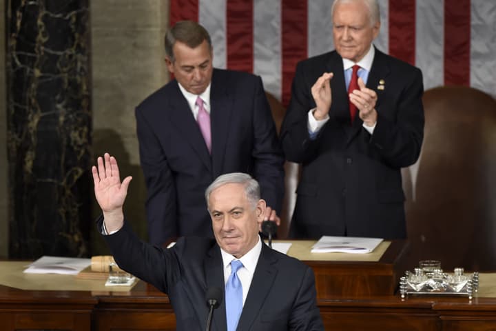 Israeli Prime Minister Benjamin Netanyahu waves as he speaks before a joint meeting of Congress on Capitol Hill in Washington, Tuesday, March 3, 2015. Since Republicans took control of Congress two months ago, an elaborate tug of war has broken out between GOP lawmakers and Obama over who calls the shots on major issues for the next two years. (AP)