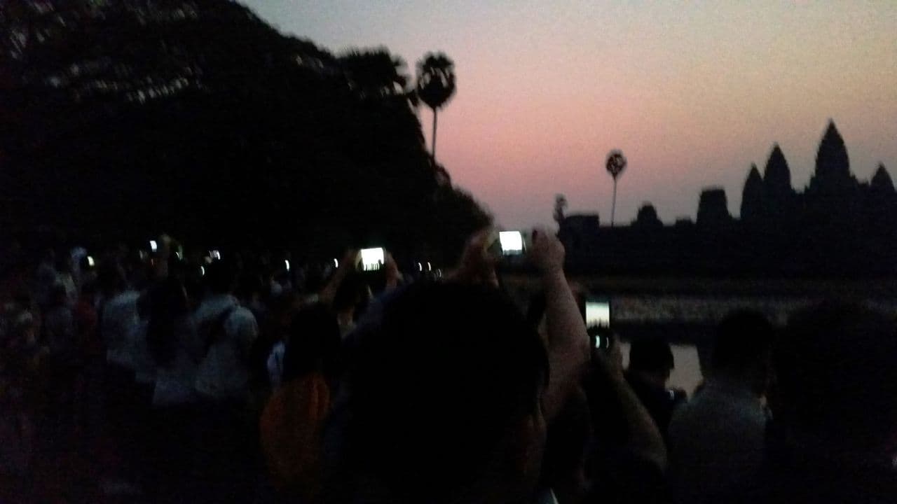 Glowing smartphones at dawn, Angor Wat, Siem Reap, Cambodia, Jan. 2015. (Courtesy)