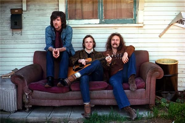 Graham Nash, Stephen Stills and David Crosby, 1969. They decided to be Crosby, Stills &amp; Nash (CSN) after this photo shoot was taken. When they all went back to retake the photos, the building had been torn down. This became their first album cover. (Henry Diltz)