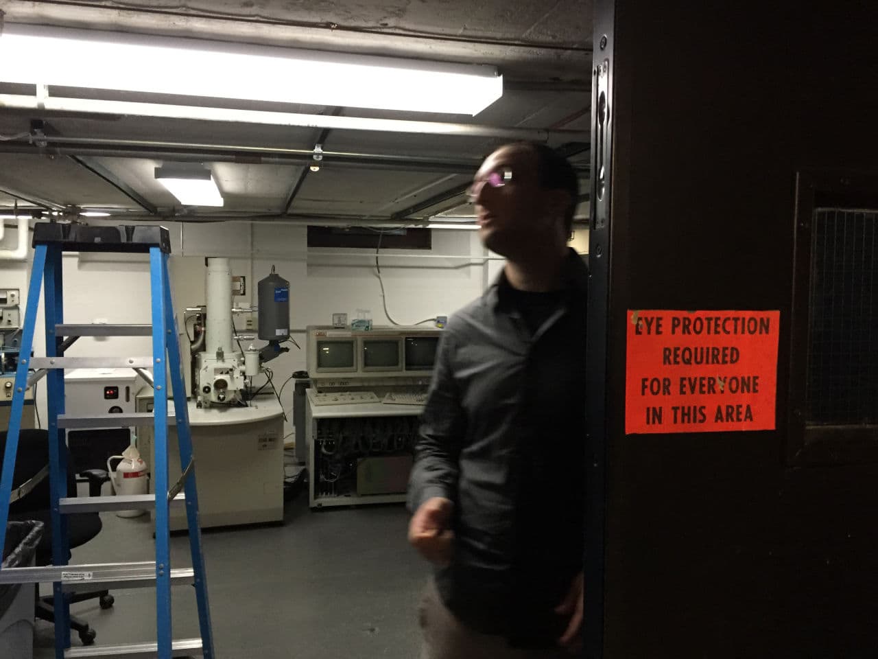 Michael Short, a nuclear engineer at MIT, makes sure to take all safety precautions in the lab. (Ari Daniel)