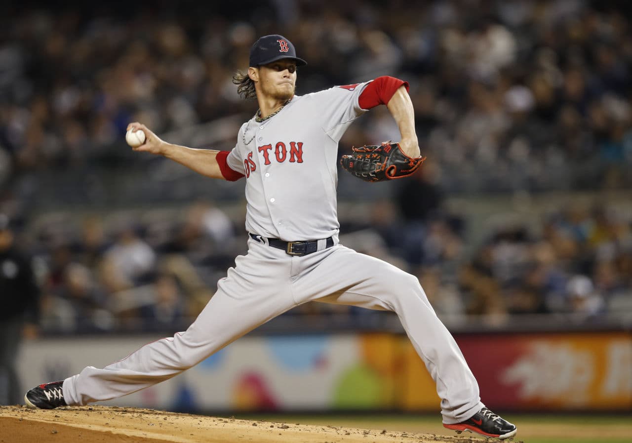 Starting pitcher Clay Buchholz winds up in the first inning against the New York Yankees in New York. (Kathy Willens/AP)