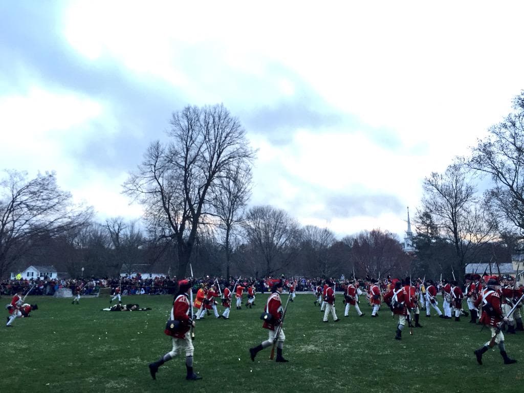 British regulars kill eight colonials in Lexington -- during a reenactment Monday morning. (Curt Nickisch/WBUR)