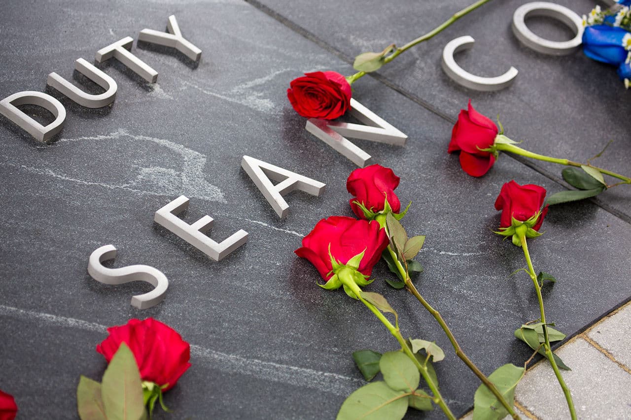 Flowers left at the memorial for Officer Sean Collier. (Jesse Costa/WBUR)