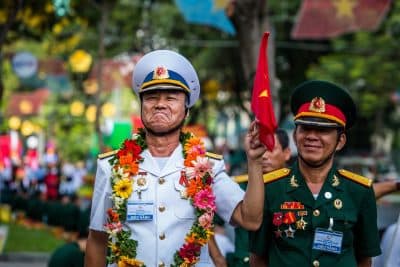 A Vietnamese Parade, And A Solemn U.S. Ceremony