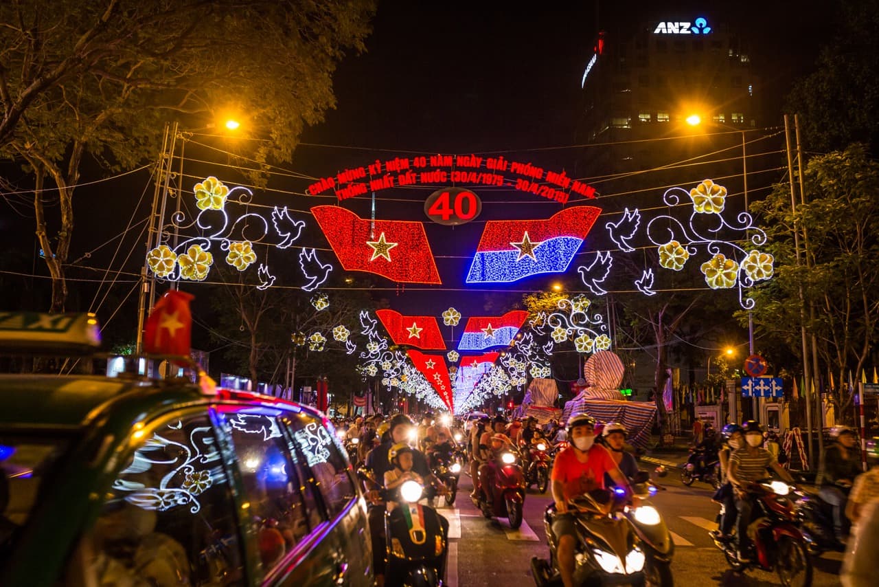 Traffic on Le Duan Street in Ho Chi Minh City on the night of April 29, just hours before a large parade celebrating the 40-year anniversary of the communist victory was to take place. (Quinn Ryan Mattingly for WBUR)