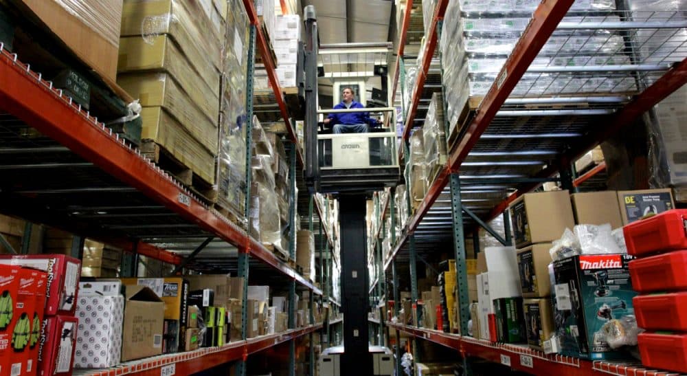 Rich Barlow: Progressives are denouncing President Obama's pending Pacific trade deal. The deal may be dumb. So is much of the criticism. In this March 5, 2015 photo, Mike Drury retrieves a pallet at the Hardware Sales Inc. warehouse in Ferndale, Wash. Officials say the company's e-commerce division could benefit from streamlined customs regulations if 12 Pacific Rim countries agree to a massive trade deal called the Trans-Pacific Partnership. Critics say the deal doesn’t do enough to protect American jobs. (Manuel Valdes/AP)