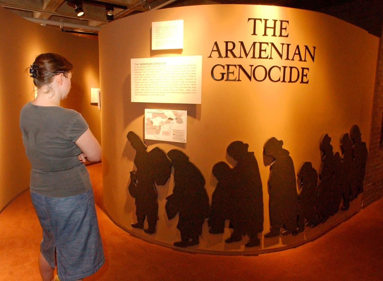 Susanne Wedlich of Newton looks at an exhibit about the Armenian genocide at the Armenian Library and Museum of America in Watertown in August 2005. (Lisa Poole/AP)