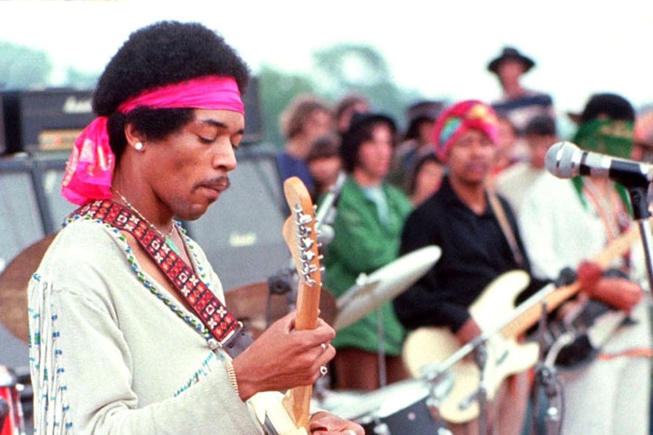 Jimi Hendrix, 1969. Jimi Hendrix playing at Woodstock. “I got to stand on the stage: it was real bizarre and psychedelic,” Diltz remembers. (Henry Diltz)