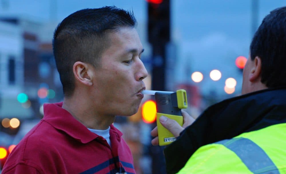 A breathalyzer test is administered. The tests were barred from evidence in most Massachusetts drunken driving cases after it was discovered that the state wasn't transparent about flaws in testing. (KOMUnews/Flickr)
