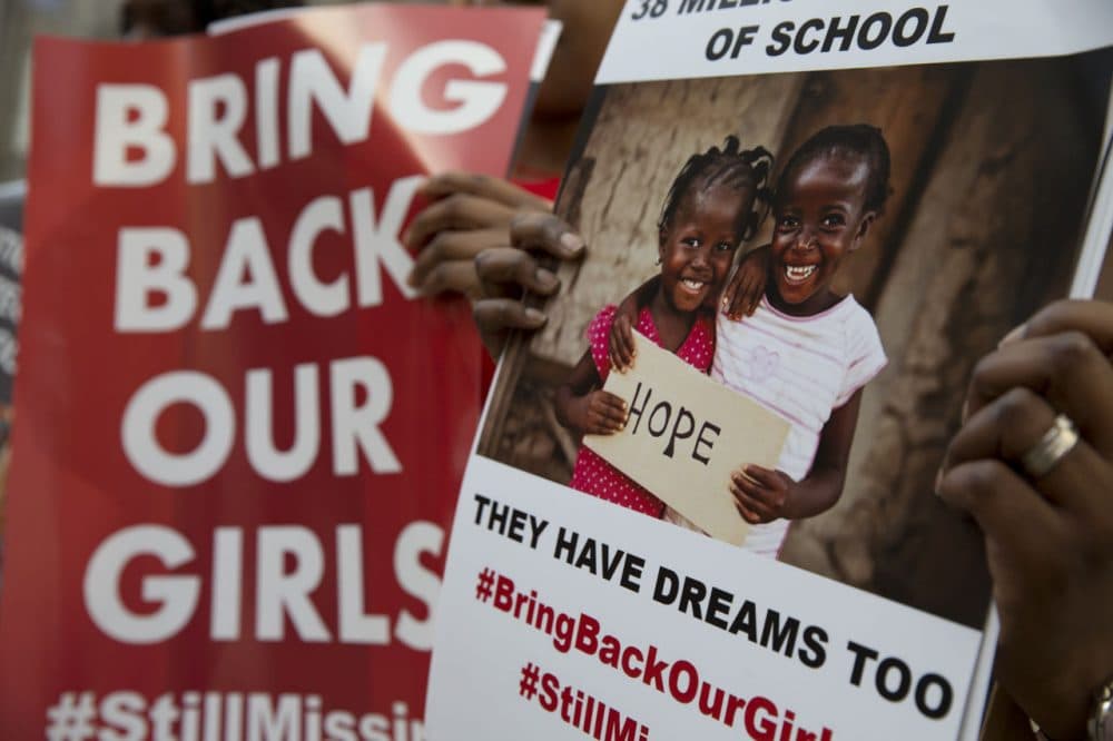 Protesters holds up placards demanding help from the Nigerian government to find the 219 girls who remain missing on the first anniversary of the kidnapping by Islamic extremists, during a demonstration Tuesday outside the Nigerian High Commission in London. April 14 marked one year since the abduction from their school in Chibok, Nigeria, but Nigeria President-elect Muhammadu Buhari said Tuesday that &quot;We do not know if the Chibok girls can be rescued. Their whereabouts remain unknown.&quot; (Alastair Grant/AP)