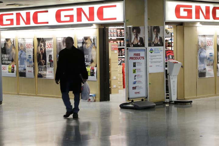 A man leaves a GNC store, Tuesday, Feb. 3, 2015 in New York. Numerous store brand supplements aren’t what their labels claim to be, an ongoing investigation of popular herbal supplements subjected to DNA testing has found, New York Attorney General Eric Schneiderman said. (AP)