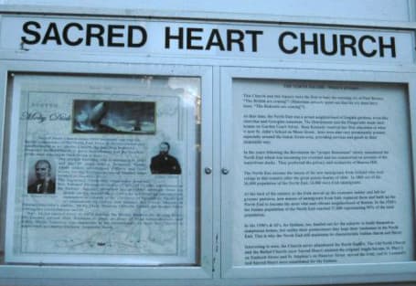 The historical marker on the Sacred Heart Church with language that reads, "Jews were also prominently present, especially around the Salem Street area, providing services and goods in their inimitable way.” (Erika Fine/Courtesy)