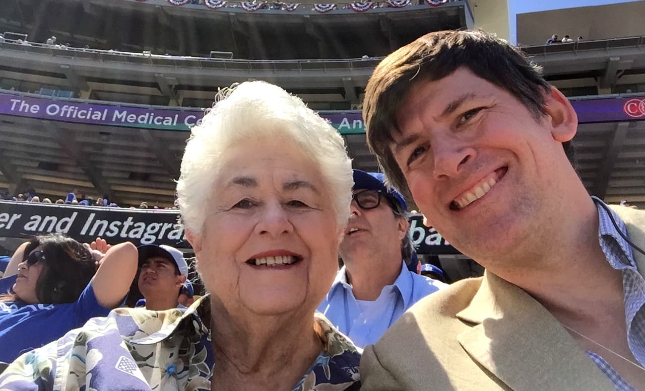 Reporter John Rabe watched Opening Day at Dodger Stadium with former L.A. City Councilwoman Roz Wyman, who played an instrumental role in bringing the Dodgers west. (John Rabe/Only A Game)