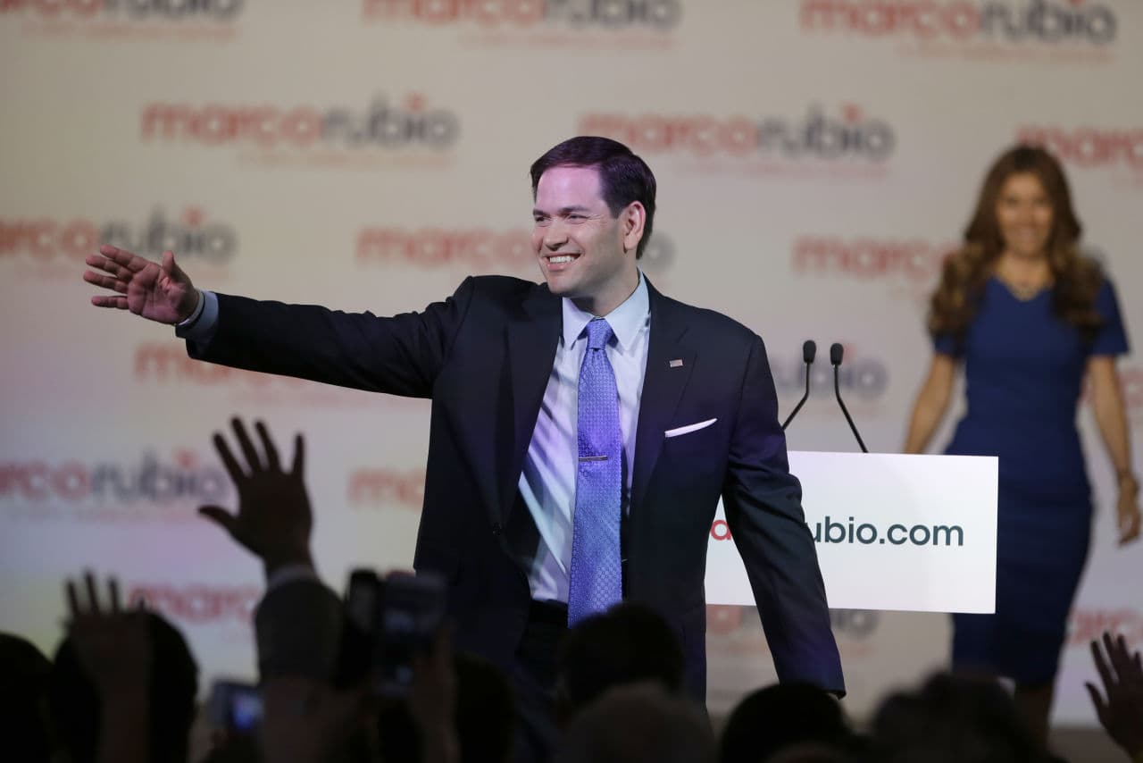 Florida Sen. Marco Rubio waves to supporters as his wife Jeanette joins him on stage, after he announced that he will be running for the Republican presidential nomination, during a rally at the Freedom Tower, Monday, April 13, 2015, in Miami. (AP)