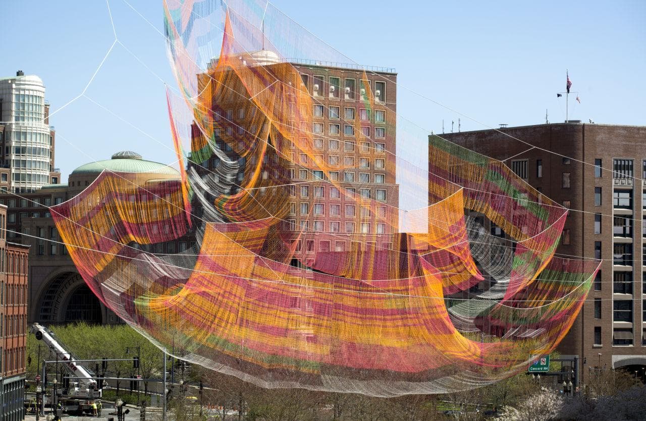 Janet Echelman's aerial sculpture suspended above the The Greenway. (Robin Lubbock/WBUR)
