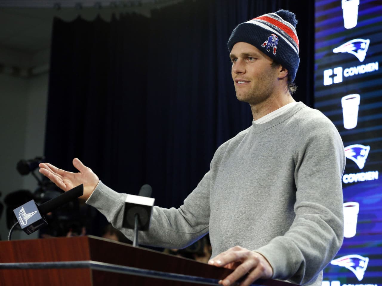 Patriots quarterback Tom Brady answers questions from the press back in January about allegations he used under-inflated footballs during the team's AFC championship win against the Colts. (Elise Amendola/AP)