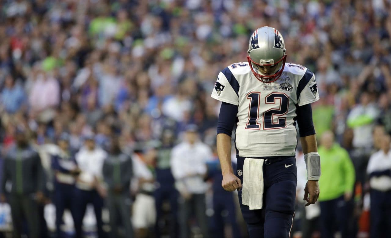 New England Patriots quarterback Tom Brady walks off the field after throwing an interception during the NFL Super Bowl XLIX against the Seattle Seahawks Sunday on Feb. 1, 2015, in Glendale, Ariz. (Matt Slocum/AP)