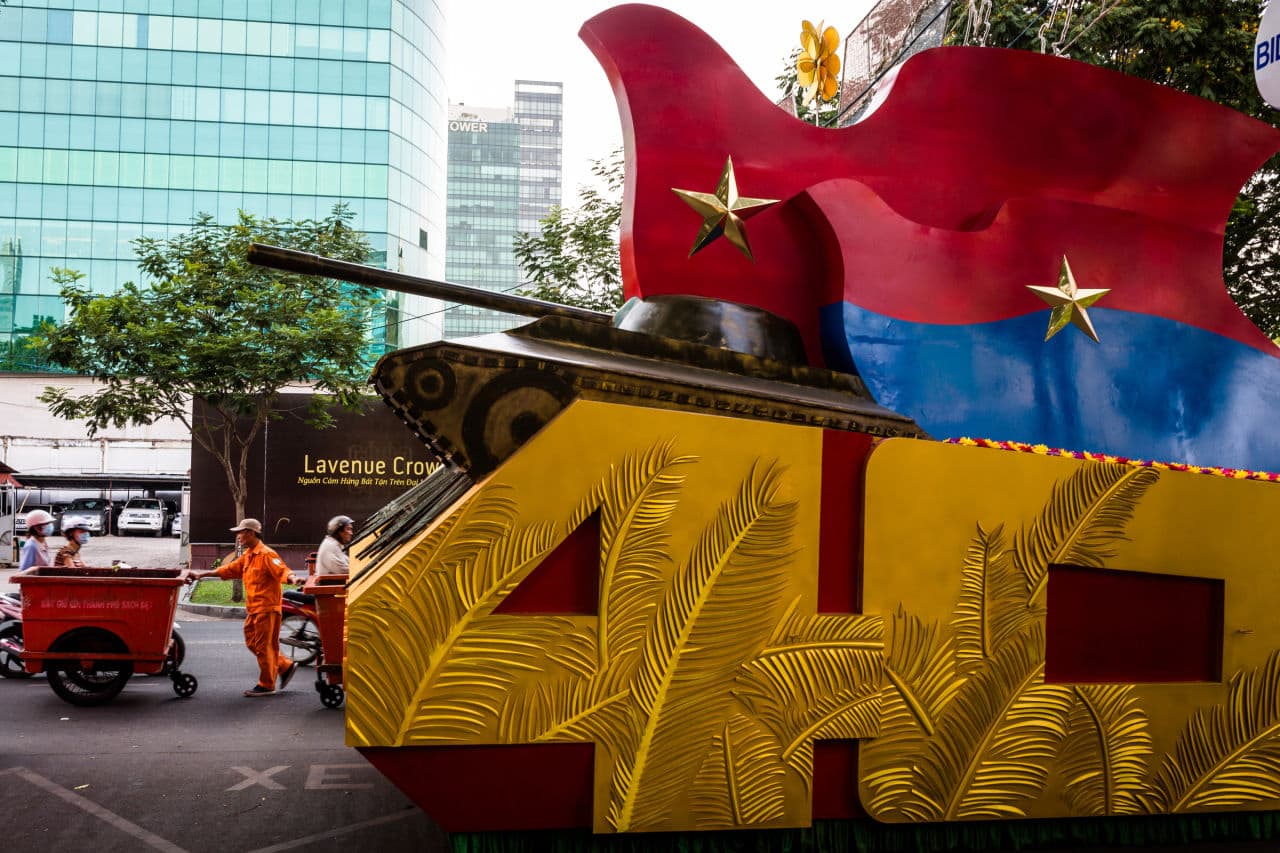 Preparations are made for Ho Chi Minh City's parade celebrating Reunification Day in Vietnam, 40 years ago. (Quinn Ryan Mattingly for WBUR)