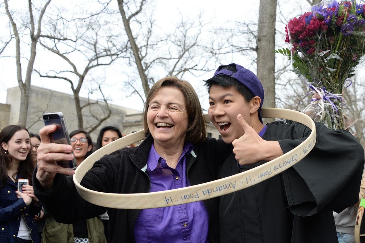 Alex Poon celebrates his victory with a selfie with College president Kim Bottomly. (Arthur Pollock/Boston Herald)