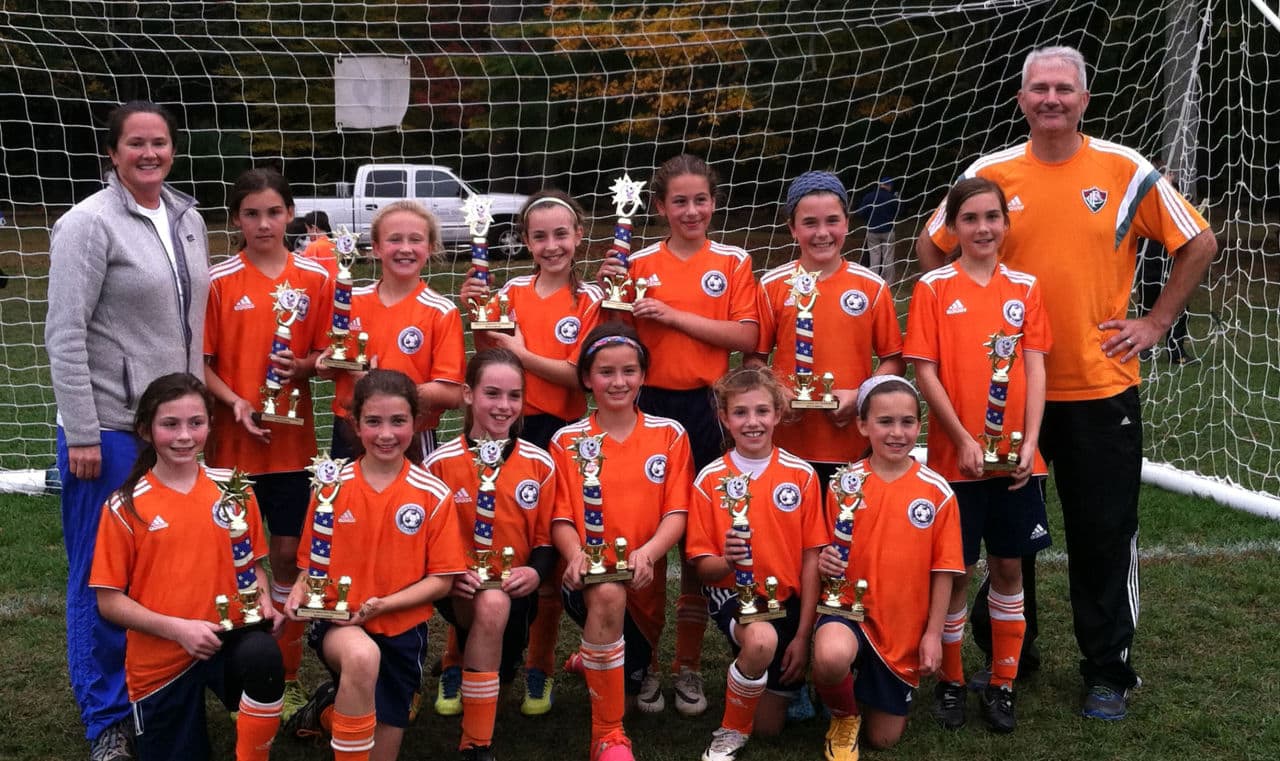 The author, top right, pictured with his daughter's soccer team. (Courtesy) 