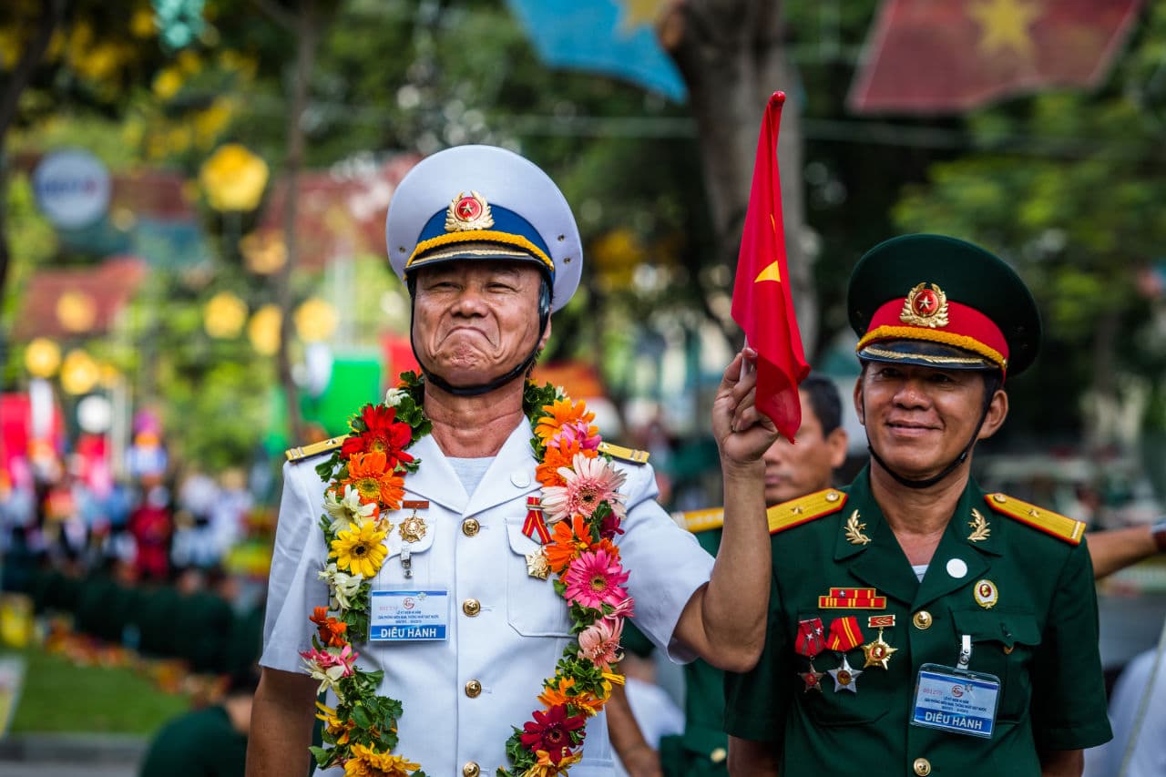 Men in military leadership pose for a portrait during the Reunification Day parade on April 30 in Ho Chi Minh City. (Quinn Ryan Mattingly for WBUR)