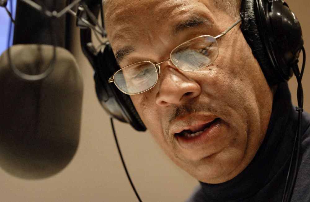 Radio host Jose Masso introduces a song during the bilingual &quot;Con Salsa!&quot; radio show on WBUR 90.9 FM in Boston in 2009. (Josh Reynolds/AP)