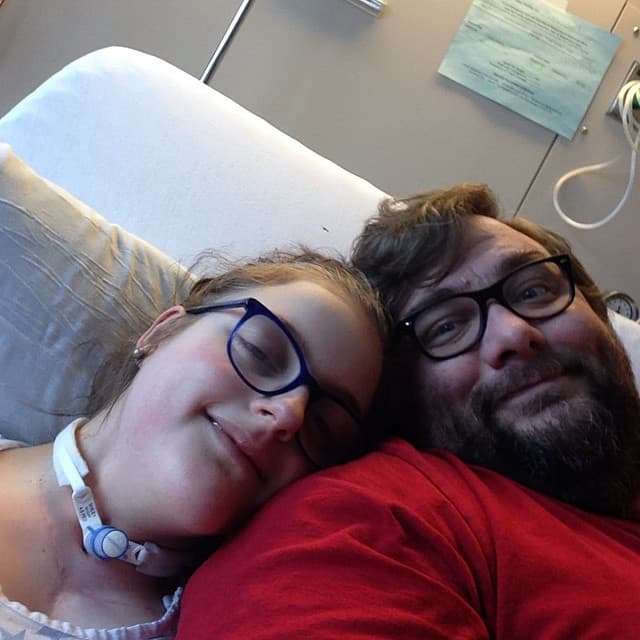 The author and his daughter, Emma, during one of her many stays at Massachusetts General Hospital in 2015. (Ben Jackson/Courtesy)