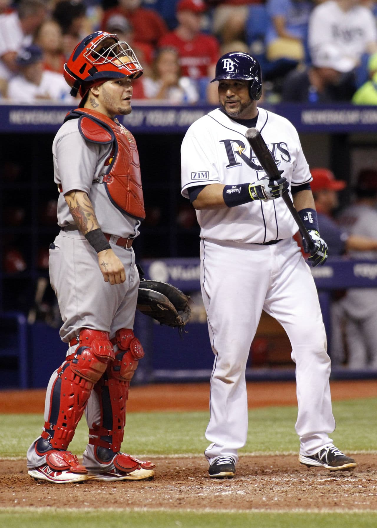 Yadier Molina leaves crackers for his brother, Jose, at the plate