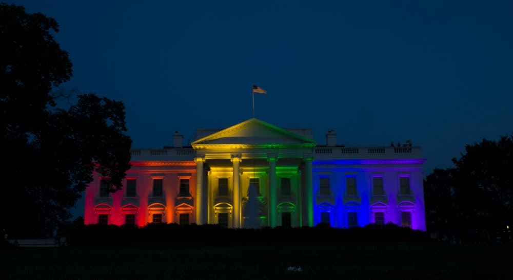 The White House is lit up in rainbow colors in commemoration of the Supreme Court's ruling to legalize same-sex marriage. Friday, June 26, 2015, in Washington. (Evan Vucci/AP)