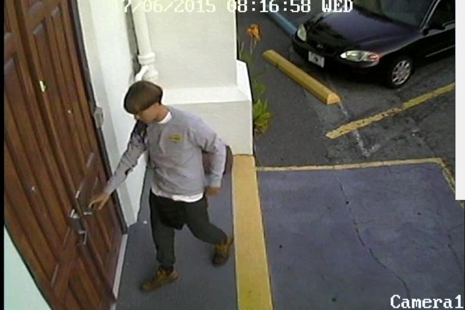 Surveillance image of suspect Dylann Roof entering the Emanuel African Methodist Episcopal Church Wednesday night. 