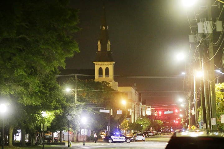 The steeple of Emanuel AME Church is visible as police close off a section of Calhoun Street early Thursday, June 18, 2015 following a shooting Wednesday night in Charleston, S.C. (AP)