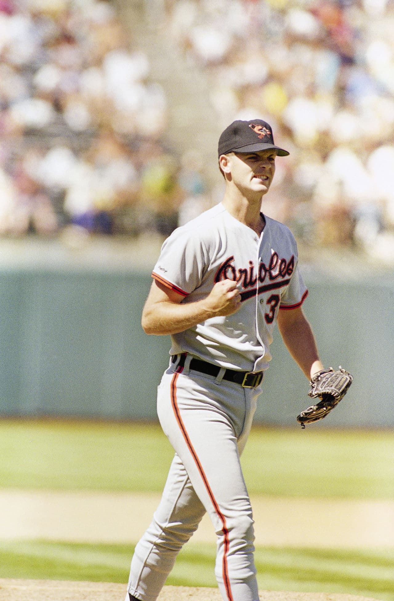 SI Photo Blog — Braves catcher Greg Olson is upended after tagging