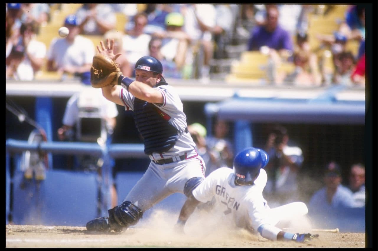 Greg Olson caught for the Braves from 1990 to 1993. (Stephen Dunn /Allsport)