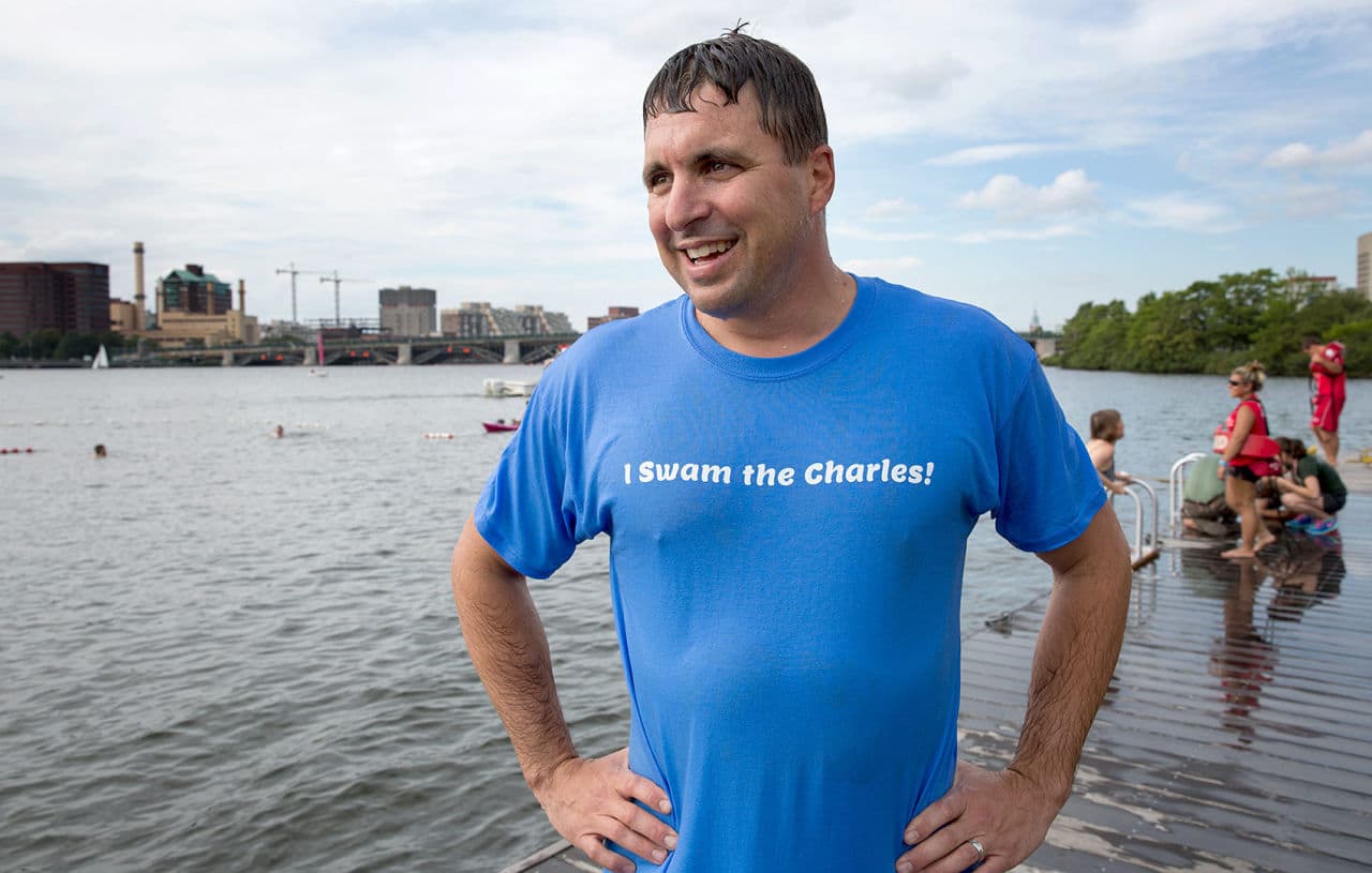 Mass. Energy and Environmental Affairs Sec. Matthew Beaton looks across the rivers after swimming in the Charles, Tuesday. (Robin Lubbock/WBUR)
