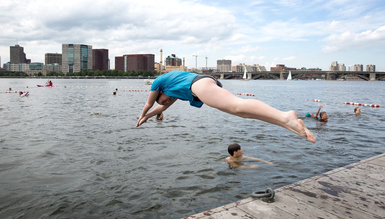Some swimmers choose to dive into the Charles. (Robin Lubbock/WBUR)