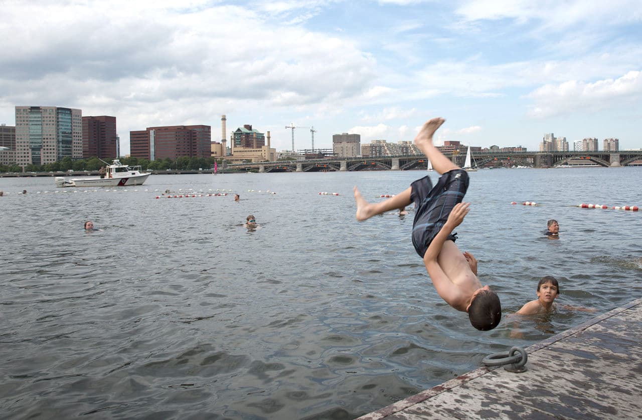 This young swimmer prefers to backflip into the river. (Robin Lubbock/WBUR)
