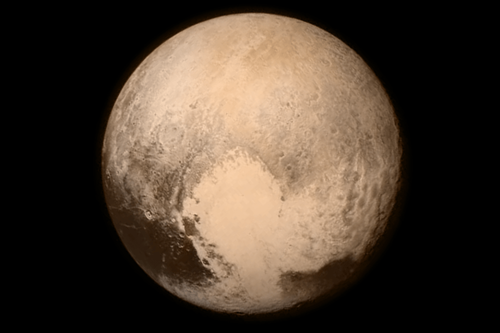 A view of Pluto from the Long Range Reconnaissance Imager (LORRI) aboard NASA's New Horizons spacecraft taken on July 13, 2015 when the spacecraft was 476,000 miles from the surface. This is the last and most detailed image sent to Earth before the spacecraft's closest approach to Pluto on July 14. (NASA/JHUAPL/SWRI)