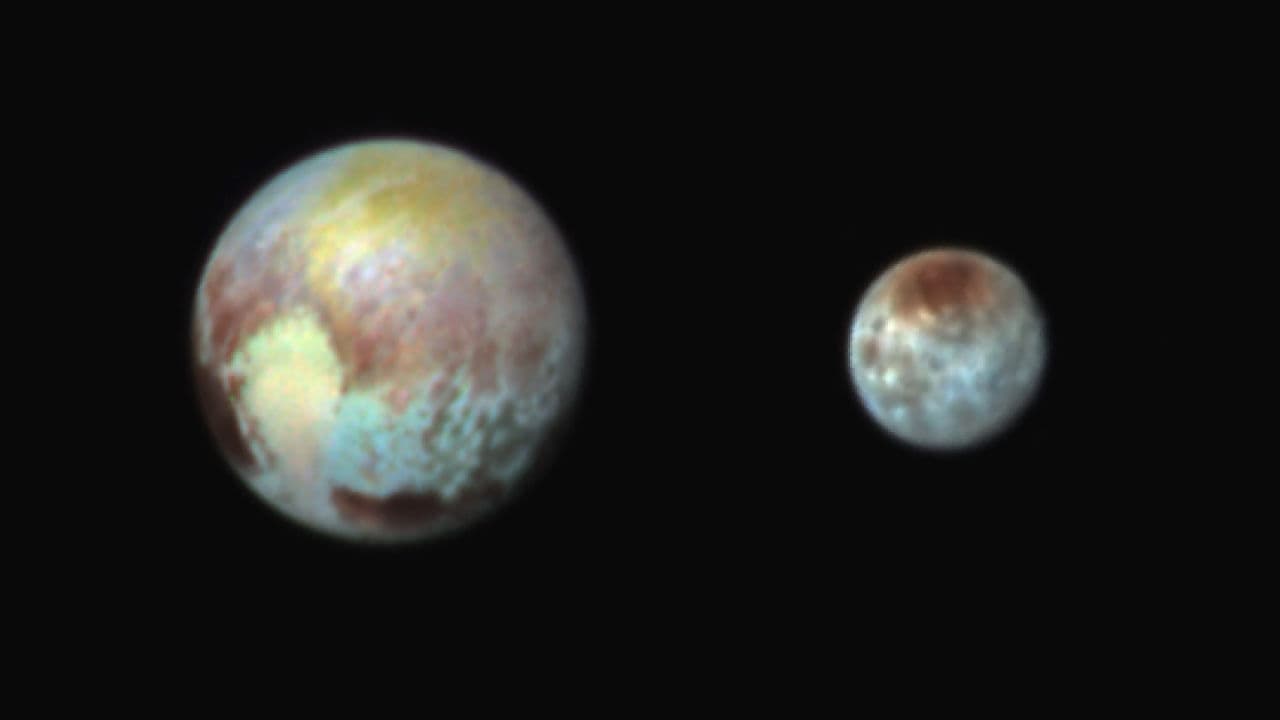 New Horizons has obtained impressive new images of Pluto and its large moon Charon that highlight their compositional diversity. (NASA/APL/SwRI)