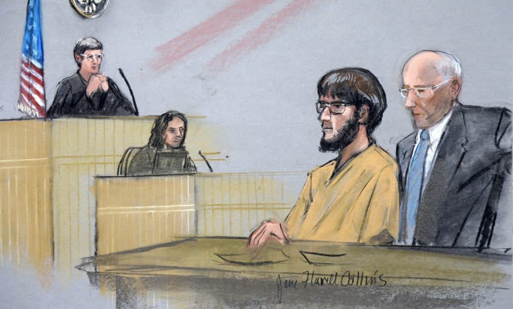 In this courtroom sketch, Alexander Ciccolo, second from right, is depicted with his attorney David Hoose, during a bail hearing July 14 in federal court in Springfield. Ciccolo's being held. (Jane Flavell Collins via AP)