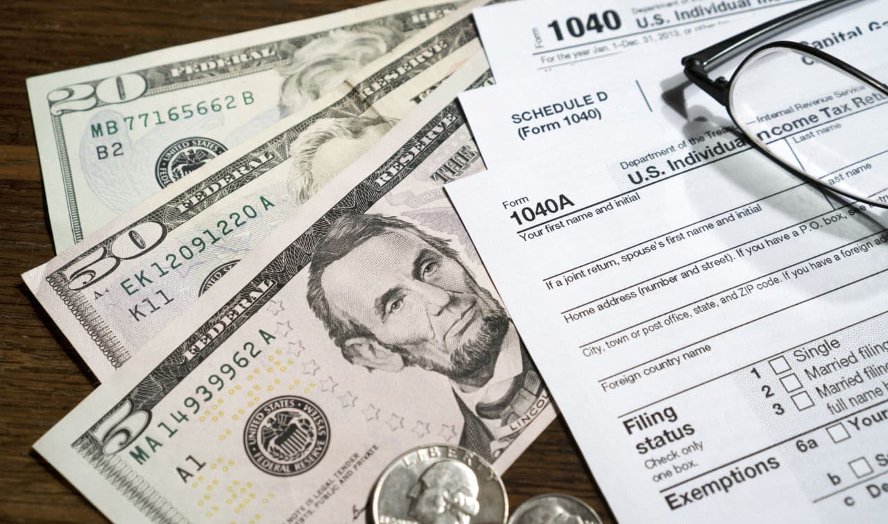 Massachusetts currently has a flat income tax of 5.15 percent. (Pictures of Money/Flickr)