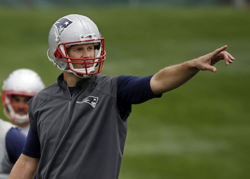New England Patriots quarterback Tom Brady calls out signals during an NFL football minicamp in Foxborough last month. (Stephan Savoia/AP)