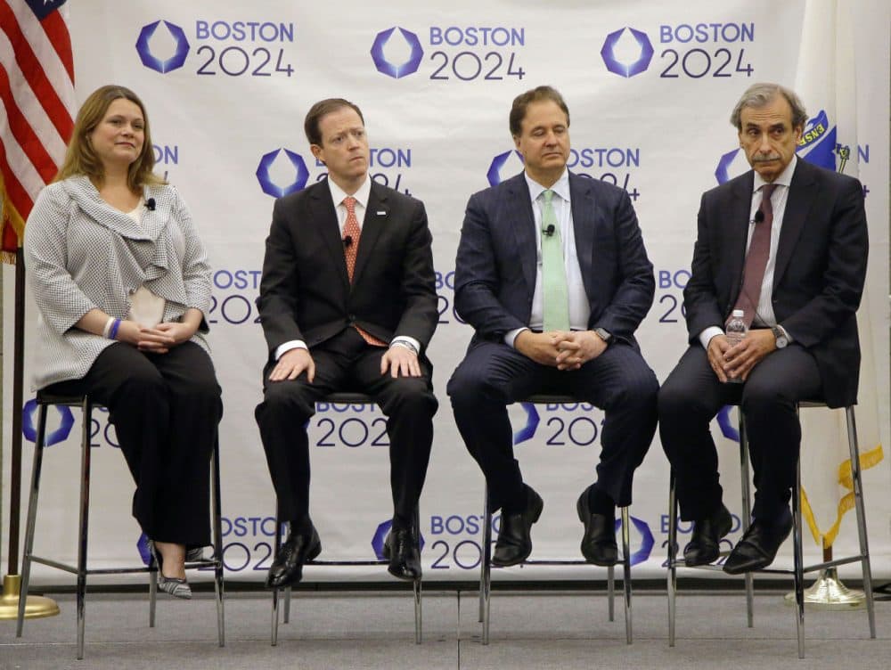 From left to right, Boston 2024 COO Erin Murphy, CEO Rich Davey, Chairman Steve Pagliuca and architect David Manfredi listen to questions during a media availability last month after releasing the group's revised bid for the 2024 Summer Olympics. (Stephan Savoia/AP)