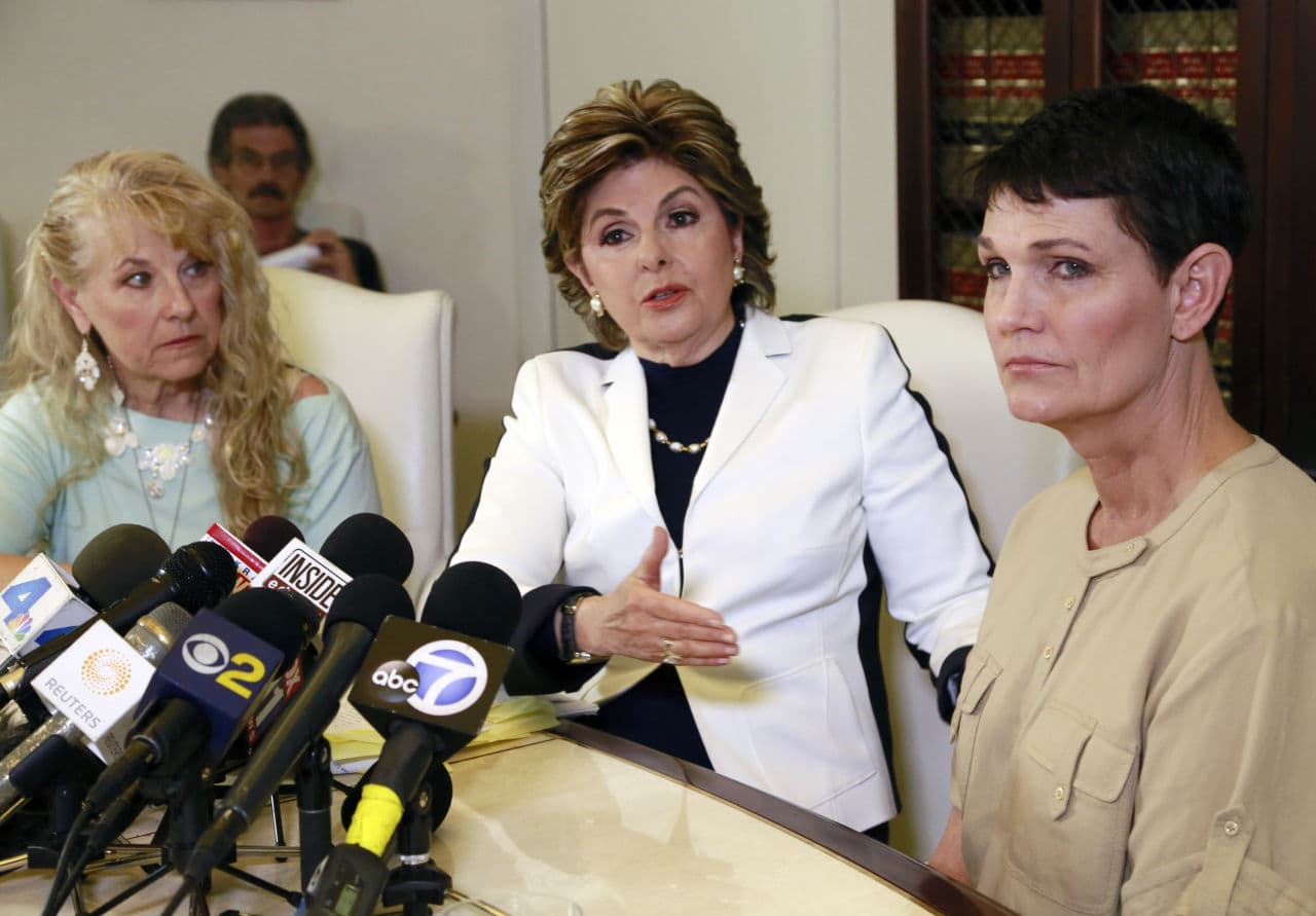 Attorney Gloria Allred, center, with clients, Rebecca Neal, left, and Beth Ferrier, right, two of Bill Cosby's accusers have who testified against Cosby in 2005 sex assault suit, announce they have joined a court bid to have Bill Cosby's full testimony from a 2005 sexual-battery lawsuit unsealed, during a news conference in Los Angeles on Monday, July 13, 2015. (Nick Ut/AP) 