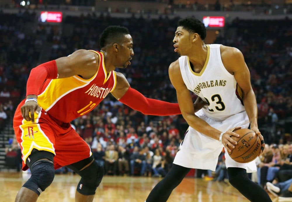 Anthony Davis resigned with the team that drafted him without much fanfare. Dwight Howard, on the other hand, Dwight Howard was courted by multiple teams when he entered free agency. (Scott Halleran/Getty Images)